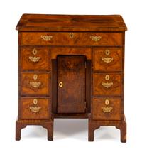 A George II Style Kneehole Desk Height 30 1/4 x width 29 3/4 x depth 18 1/4 inches. — 20TH CENTURY
