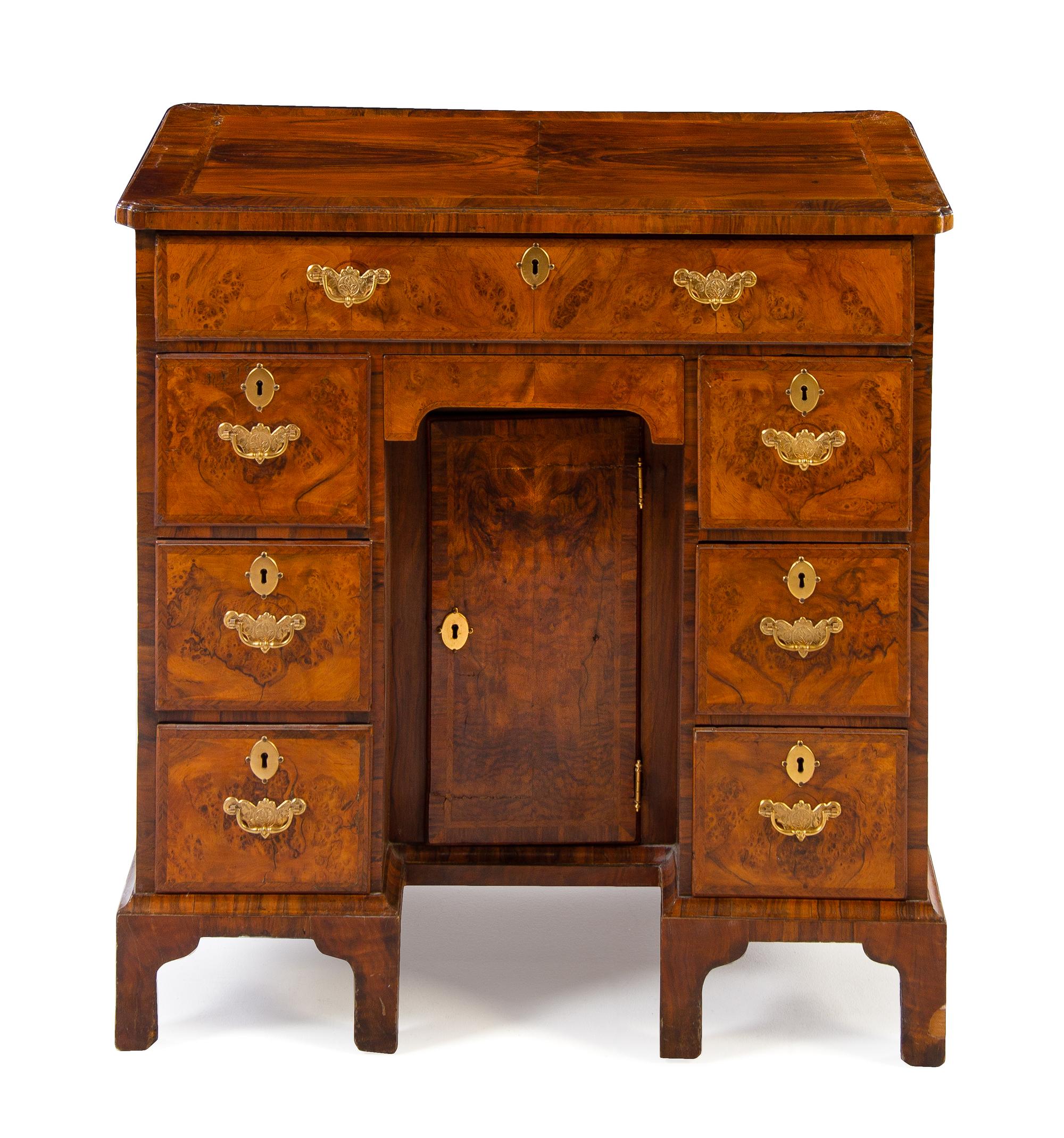 A George II Style Kneehole Desk Height 30 1/4 x width 29 3/4 x depth 18 1/4 inches. — 20TH CENTURY