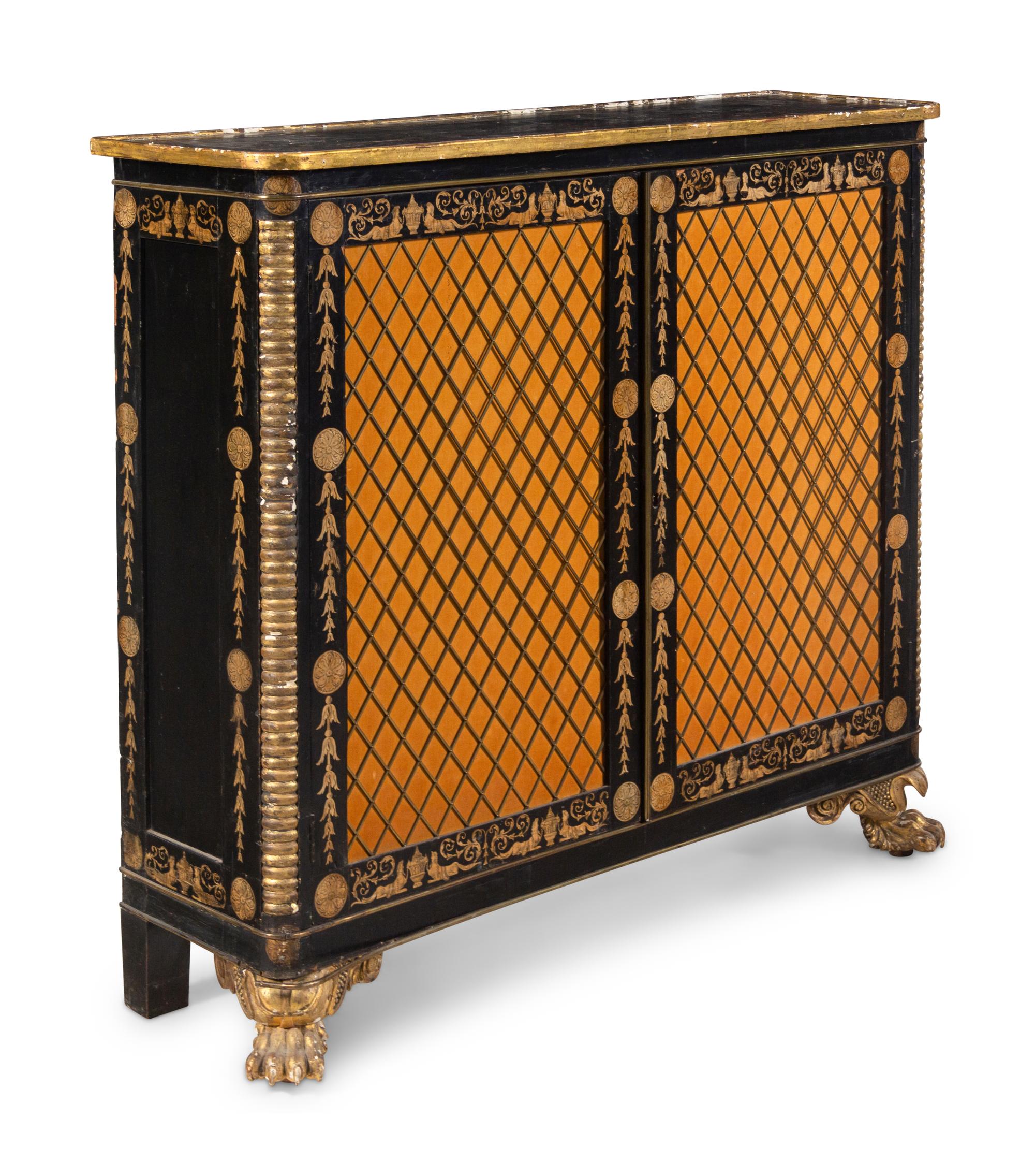 A Regency Style Parcel Gilt and Ebonized Penwork Cabinet