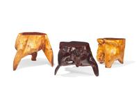 Set of three wooden stump stools