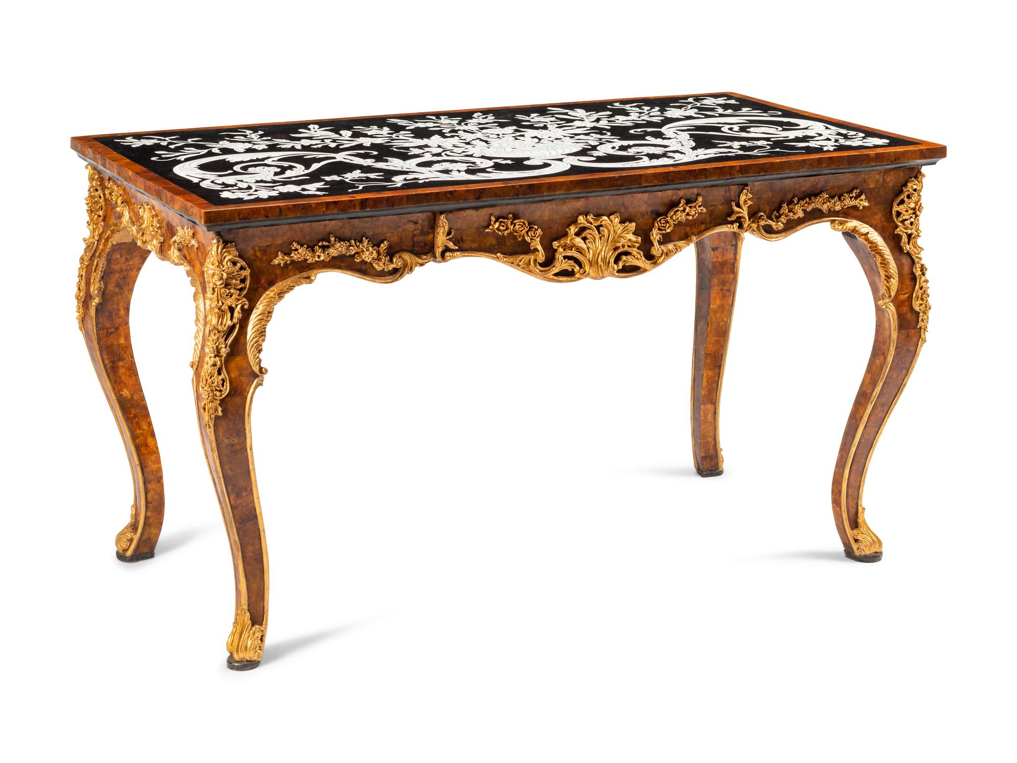 An Italian Baroque Style Parcel Gilt Shell and Marble-Veneered Table