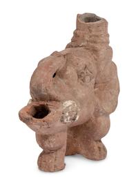 Ten Roman Terracotta Oil Lamps and a Holy Land Pottery Jug