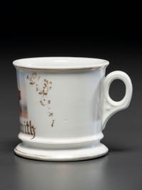 A Porcelain Occupational Shaving Mug Depicting a Steam Tractor