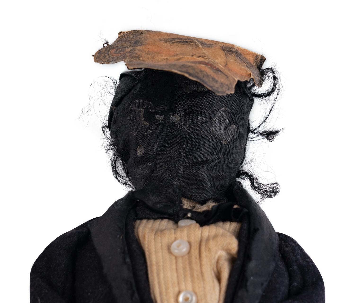 [LINCOLN-JOHNSON CAMPAIGN]. A folk art doll of Abraham Lincoln in long frock coat, ca. 1864.