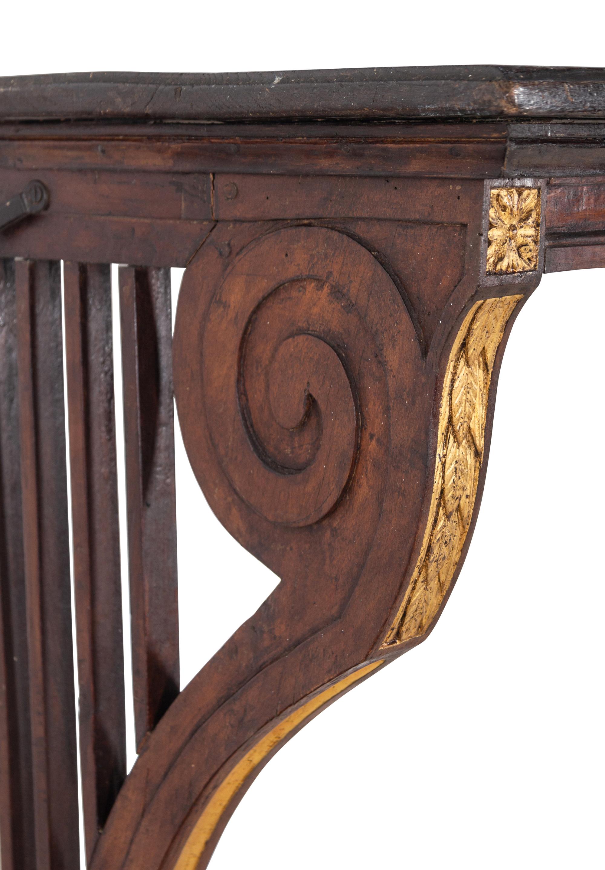 A Pair of Continental Parcel Gilt Walnut Console Tables