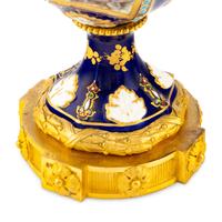 A Pair of Sèvres Style Porcelain, Enameled and Gilt Bronze Mounted Urns