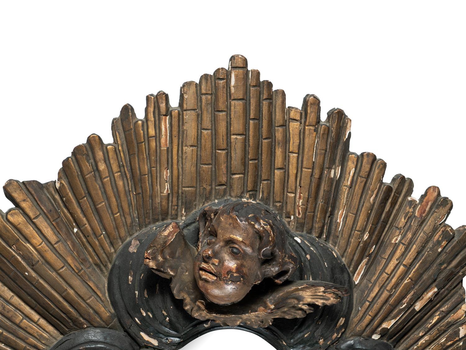 A Florentine Giltwood Mirror