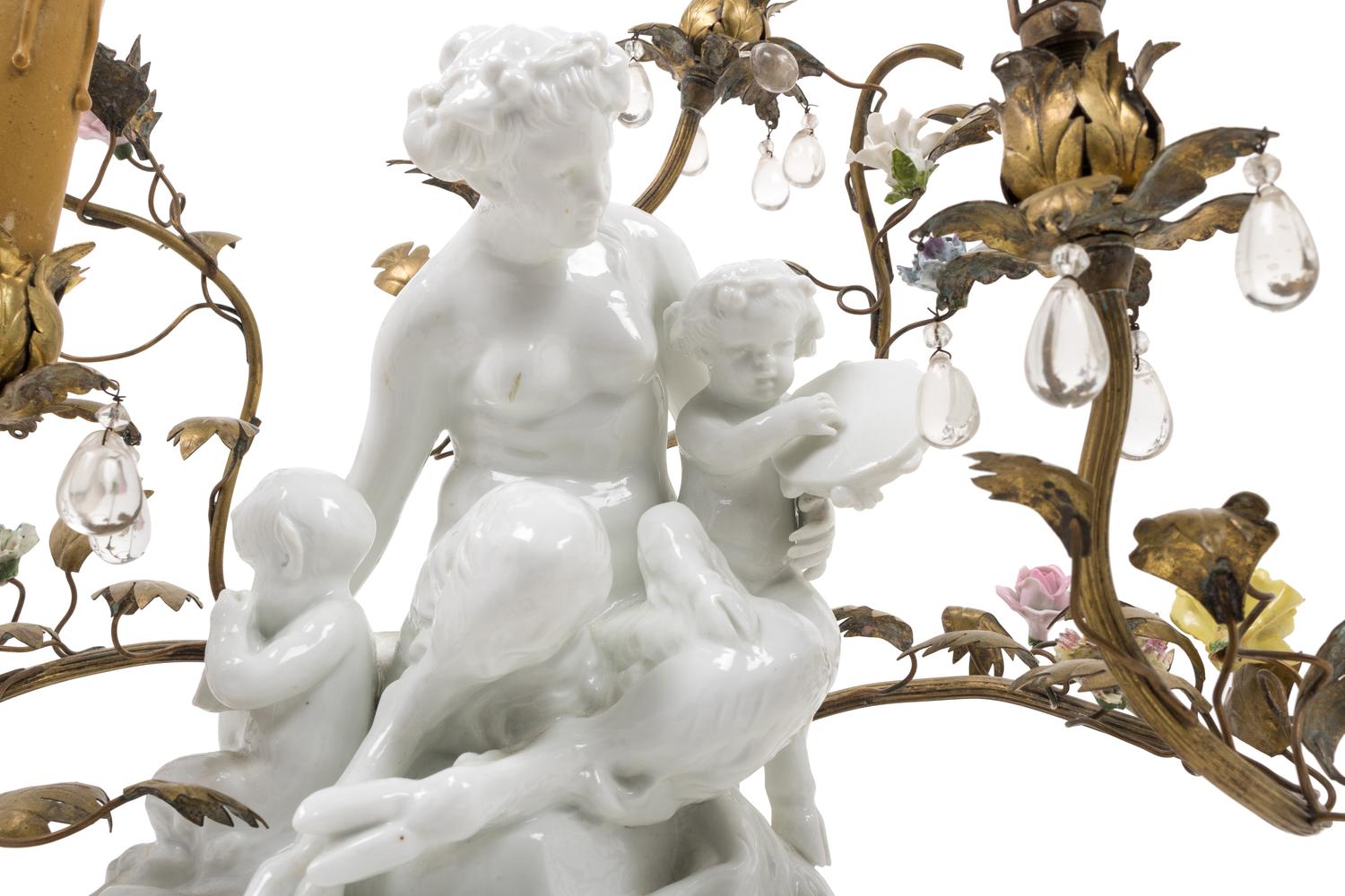 A Gilt Metal Mounted White Glazed Porcelain Figural Group after Clodion Mounted as a Lamp