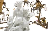 A Gilt Metal Mounted White Glazed Porcelain Figural Group after Clodion Mounted as a Lamp