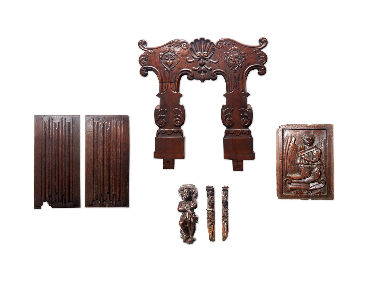 A Group of Seven English and Continental Renaissance / Baroque Carved Oak and Walnut Architectural Fragments