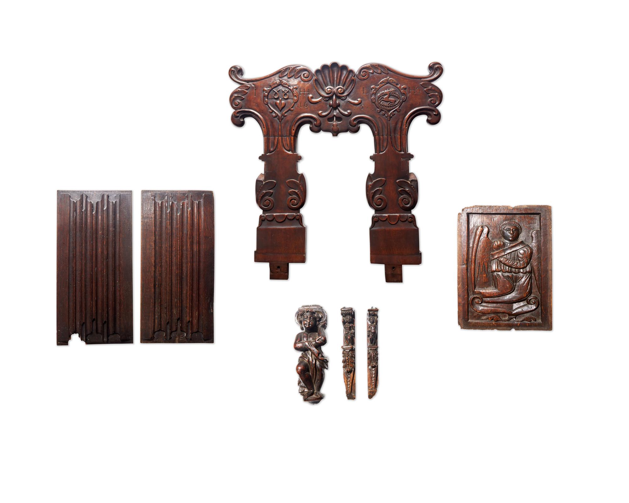 A Group of Seven English and Continental Renaissance / Baroque Carved Oak and Walnut Architectural Fragments
