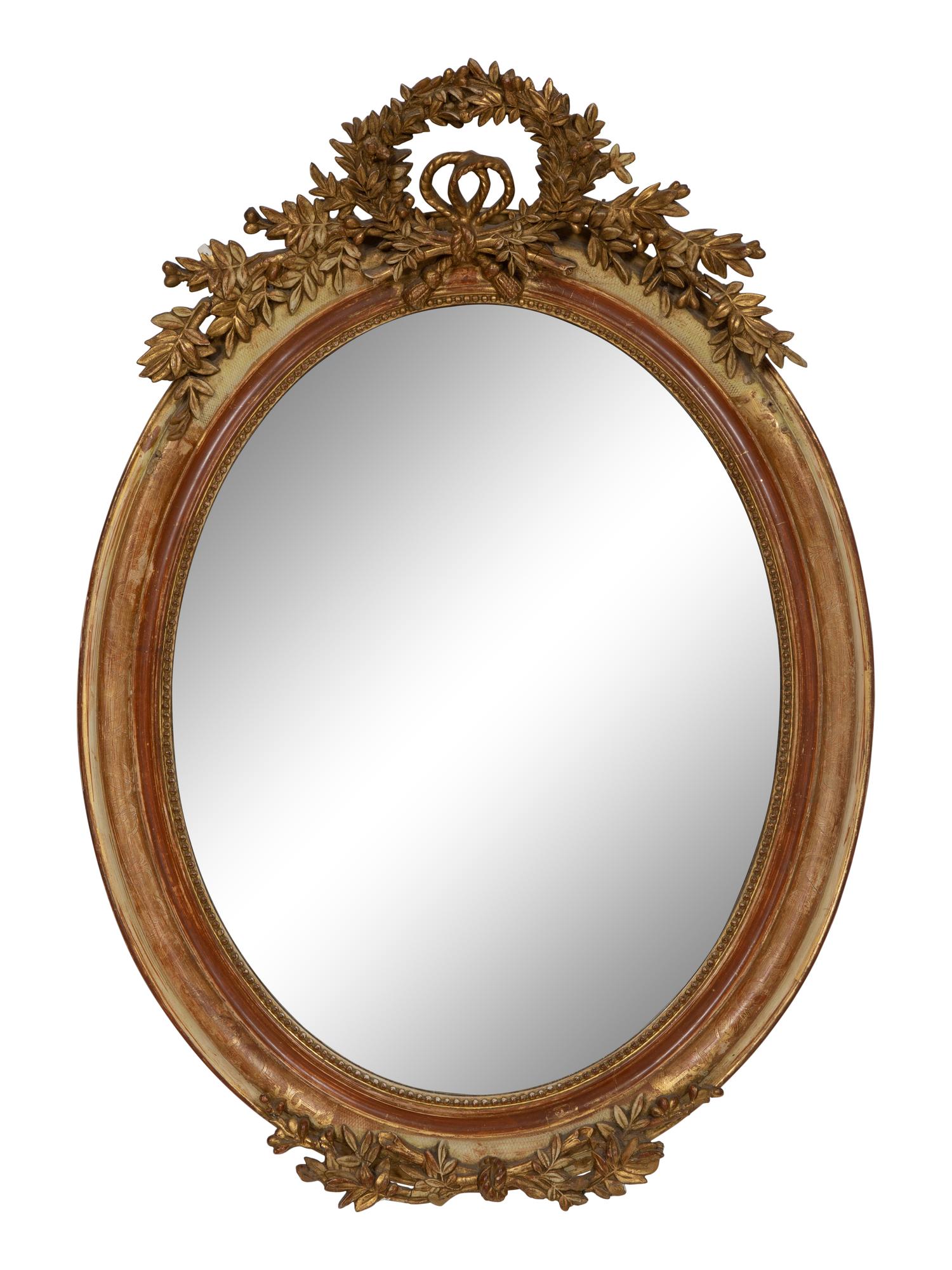 A Napoleon III Giltwood Oval Mirror