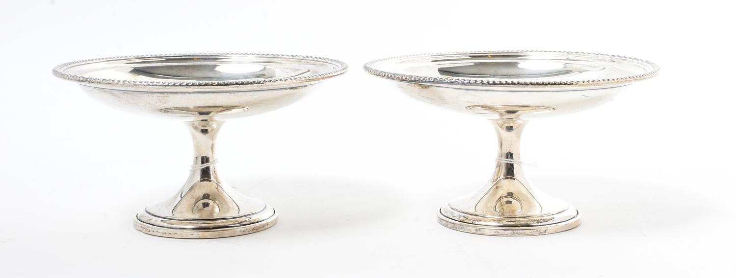 A Pair of American Silver Compotes, Gorham Mfg. Co., Providence, RI, the bowls with a gadroon rim, centered by an engraved script monog