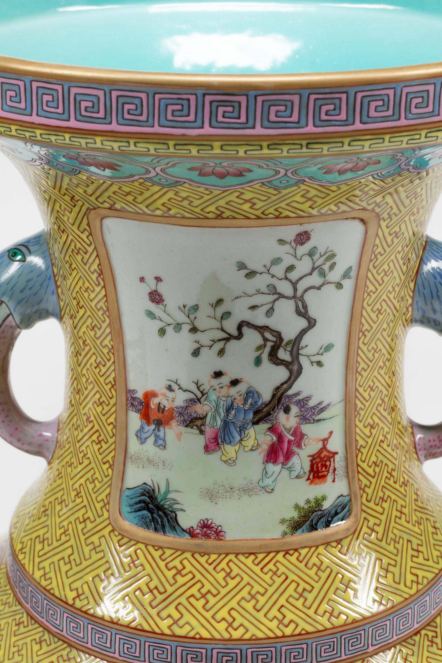 A Pair of Chinese Export Enameled Porcelain Vases with Giltwood Bases