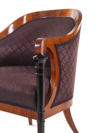 A Set of Four Biedermeier Mahogany Veneered and Parcel Ebonized Armchairs