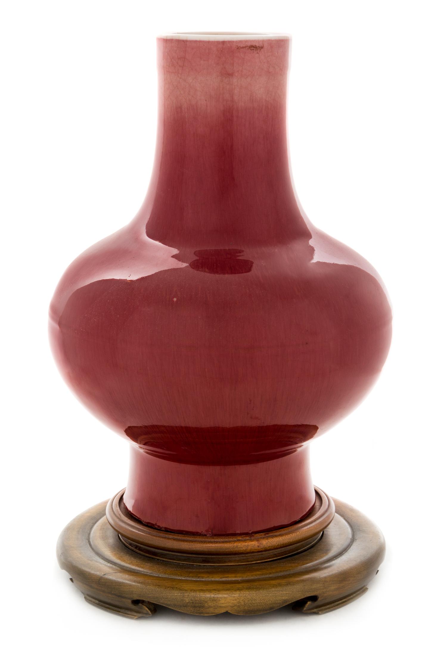 A Large Sang-de-Boeuf Glazed Porcelain Baluster Vase Height 13 1/4 inches. — 19TH CENTURY