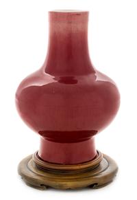A Large Sang-de-Boeuf Glazed Porcelain Baluster Vase Height 13 1/4 inches. — 19TH CENTURY