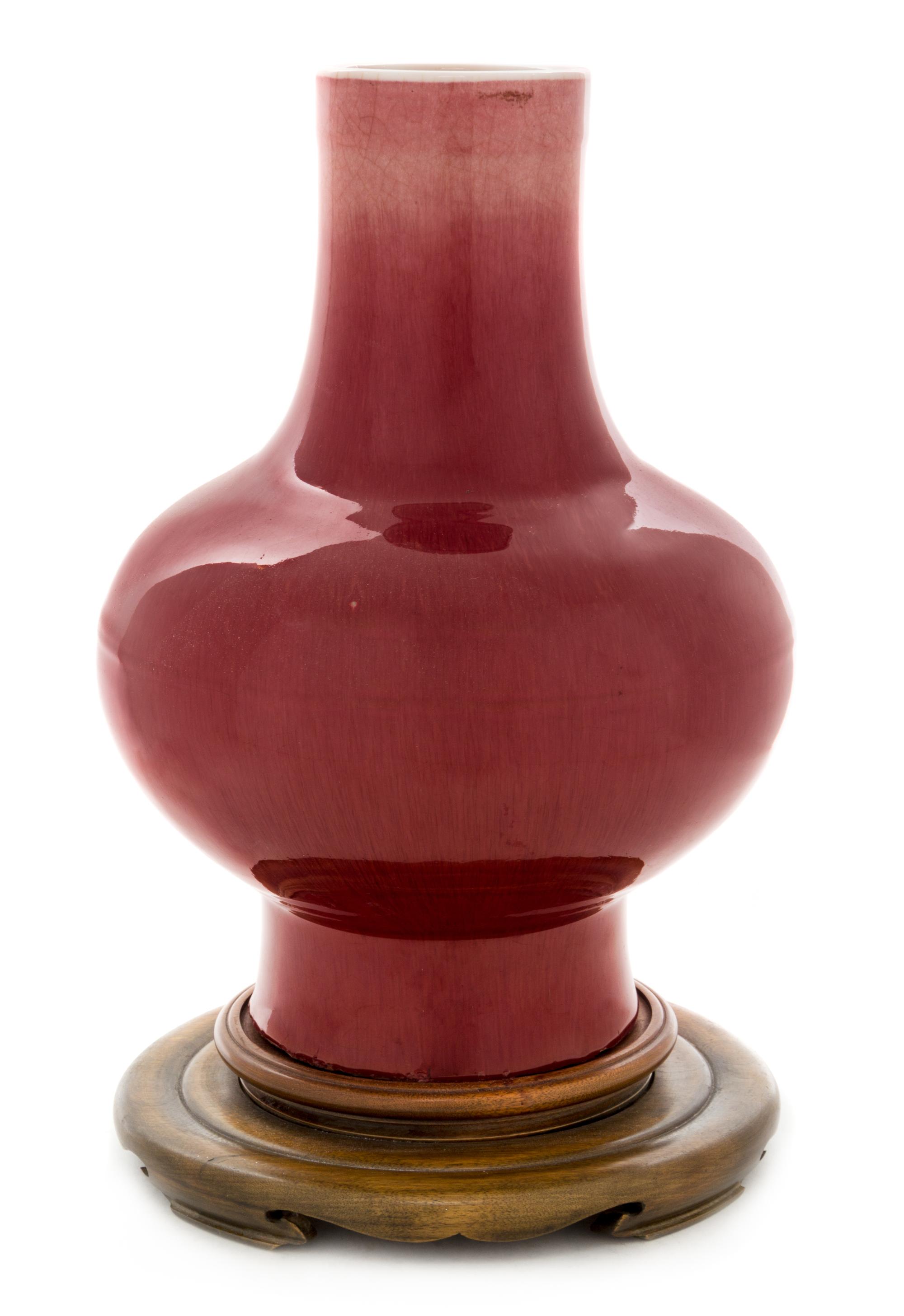 A Large Sang-de-Boeuf Glazed Porcelain Baluster Vase Height 13 1/4 inches. — 19TH CENTURY