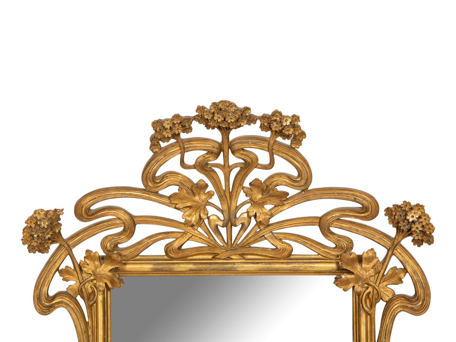 A Continental Art Nouveau Giltwood Mirror