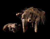 An Oceanic Decorated Crocodile Skull and Boar Skull