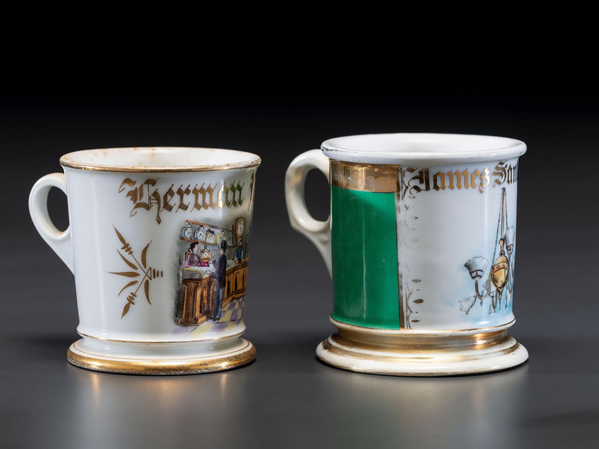 Two Retailer's Porcelain Occupational Shaving Mugs