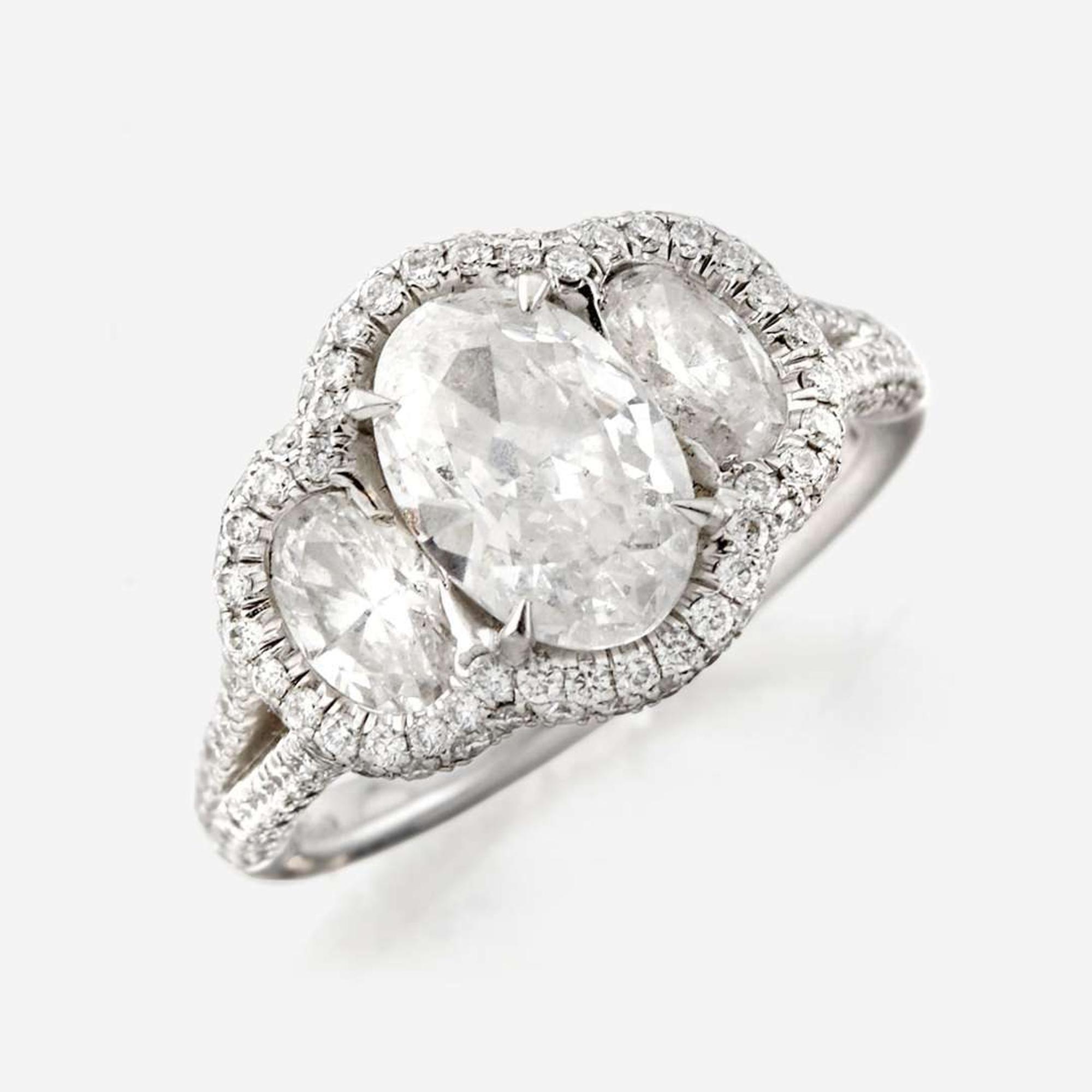 A diamond and platinum ring, JB Star