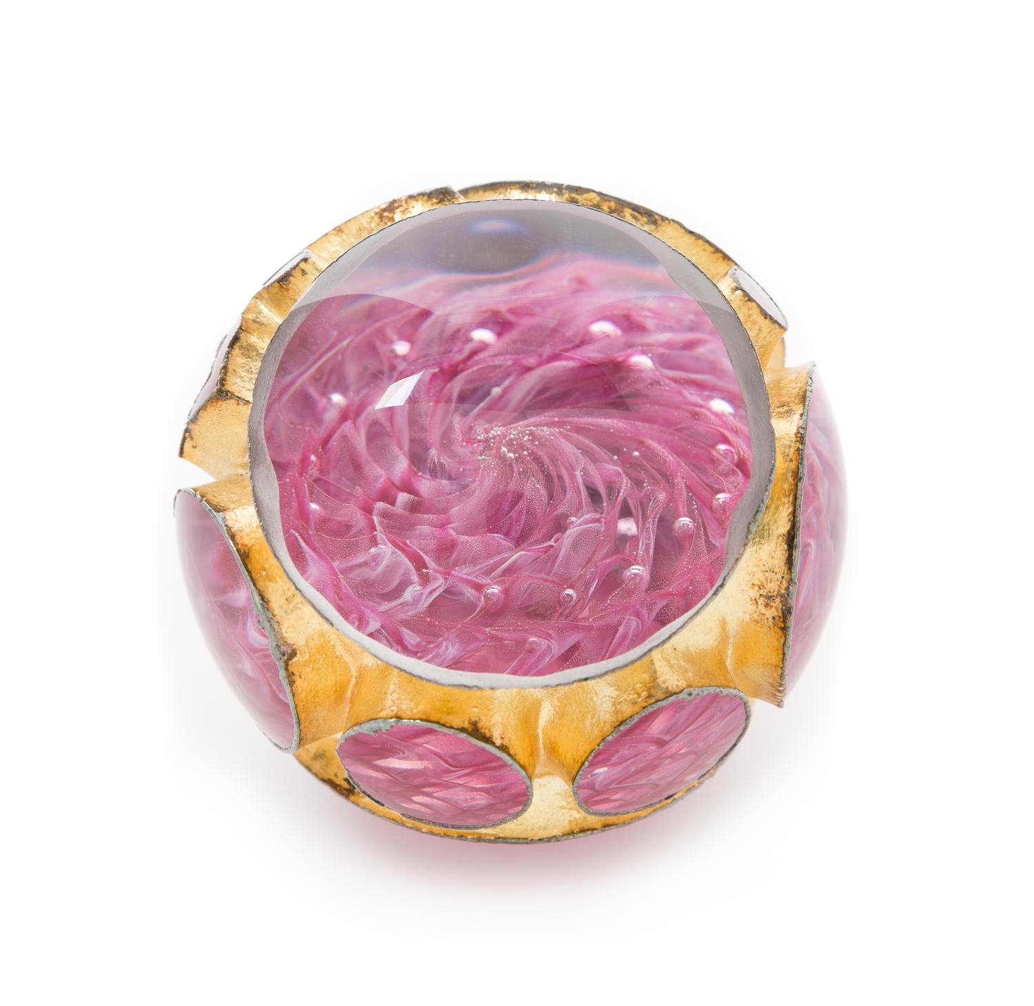 Andrew Fote, (American), a gold-encased paperweight