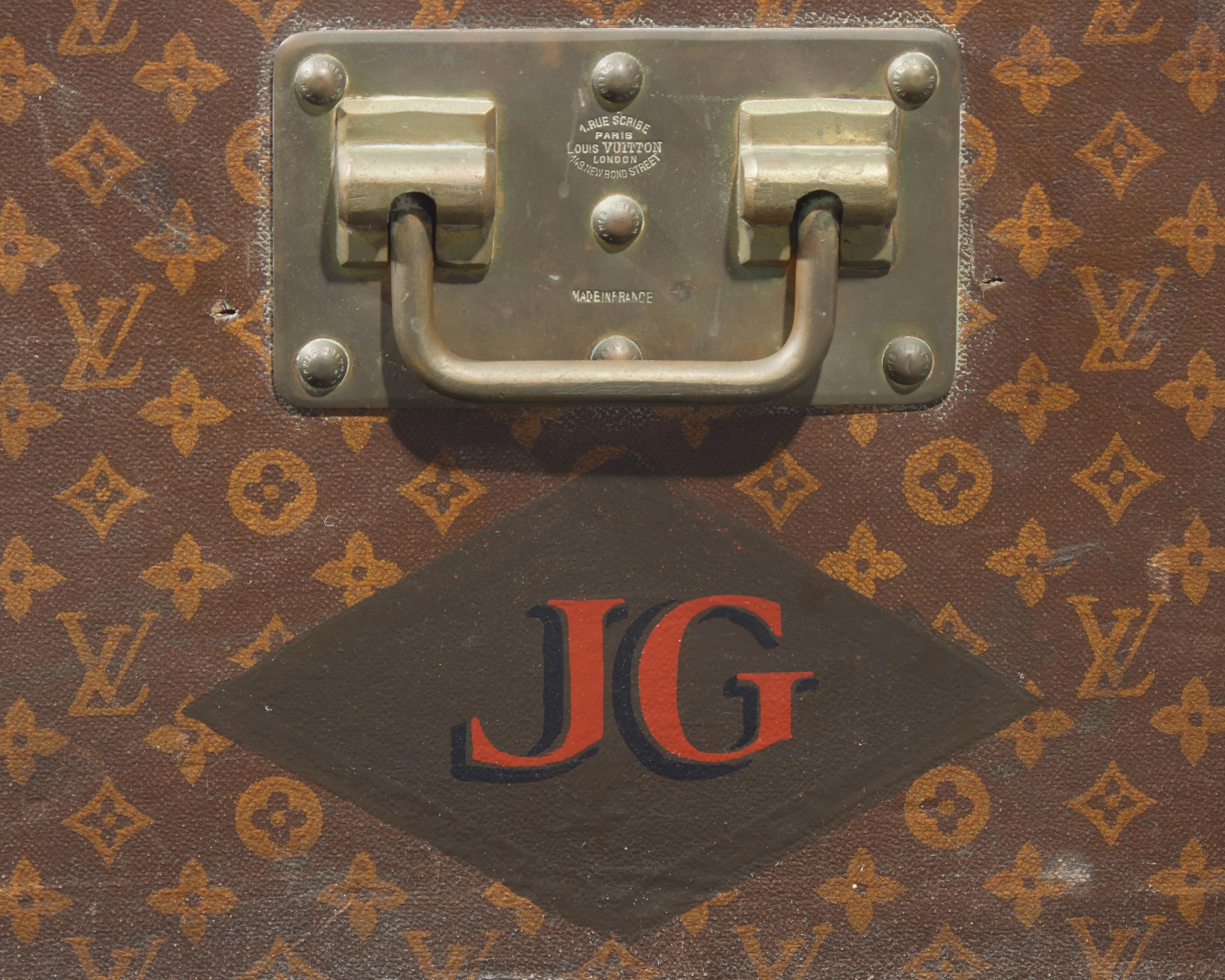 A Louis Vuitton Monogrammed Canvas Hardsided Trunk with 'JG' Monogram