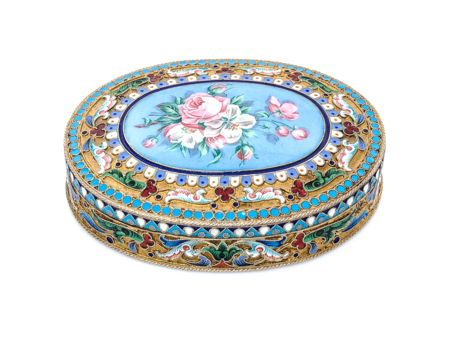 A Russian Silver-Gilt and Enamel Snuff Box, Mark of Ivan Saltykov, Moscow, late 19th century, of oval form, the lid centered by an enam
