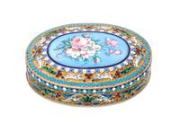 A Russian Silver-Gilt and Enamel Snuff Box, Mark of Ivan Saltykov, Moscow, late 19th century, of oval form, the lid centered by an enam