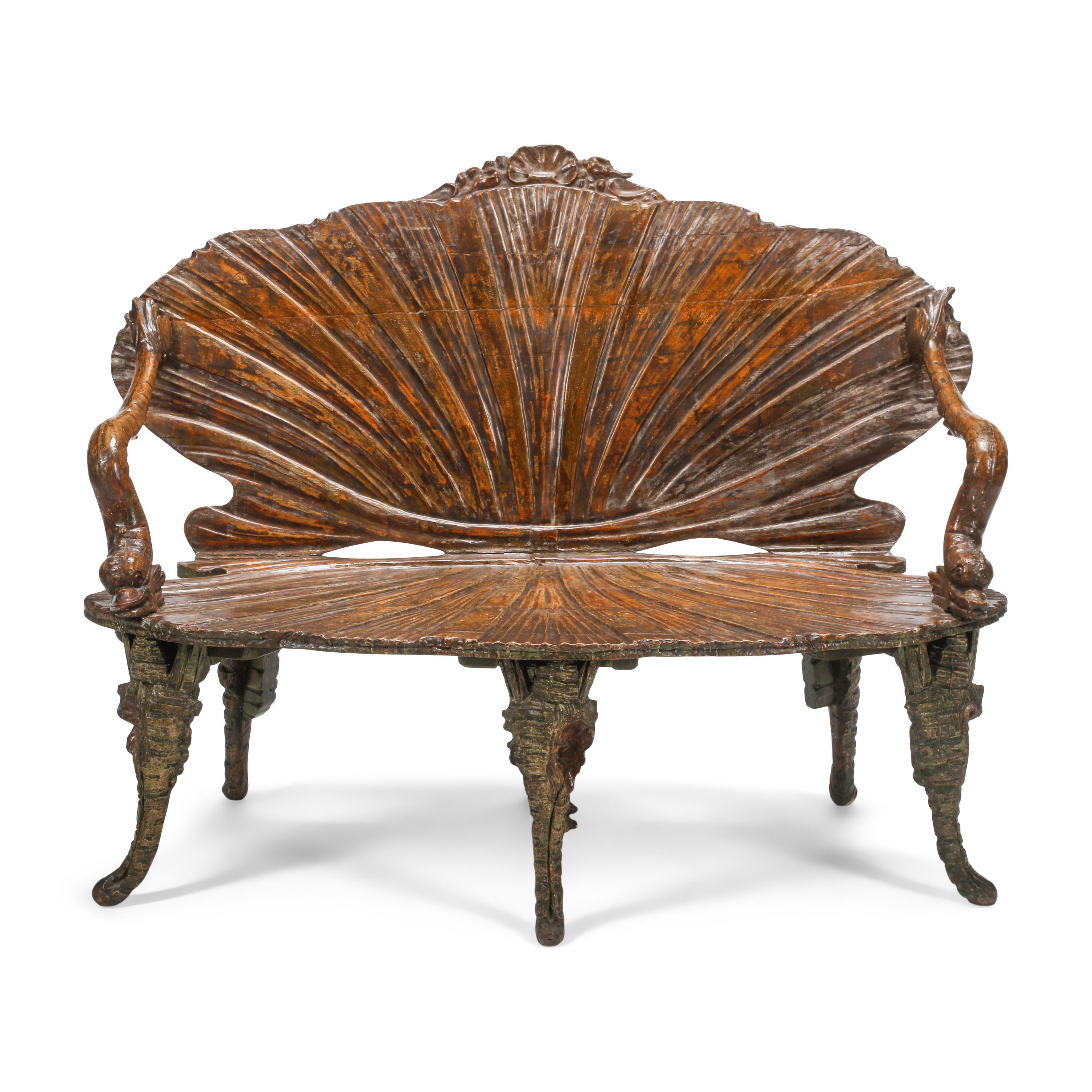 An Italian Carved Three-Piece "Grotto" Seating Suite