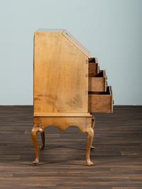 A Diminutive Queen Anne Style Tiger Maple Desk on Stand
