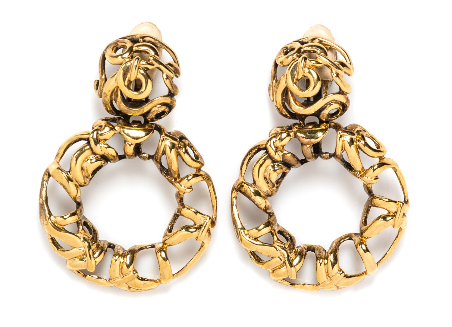 A Pair of Les Bernard Goldtone Large Drop Earclips, 3" x 2.5".