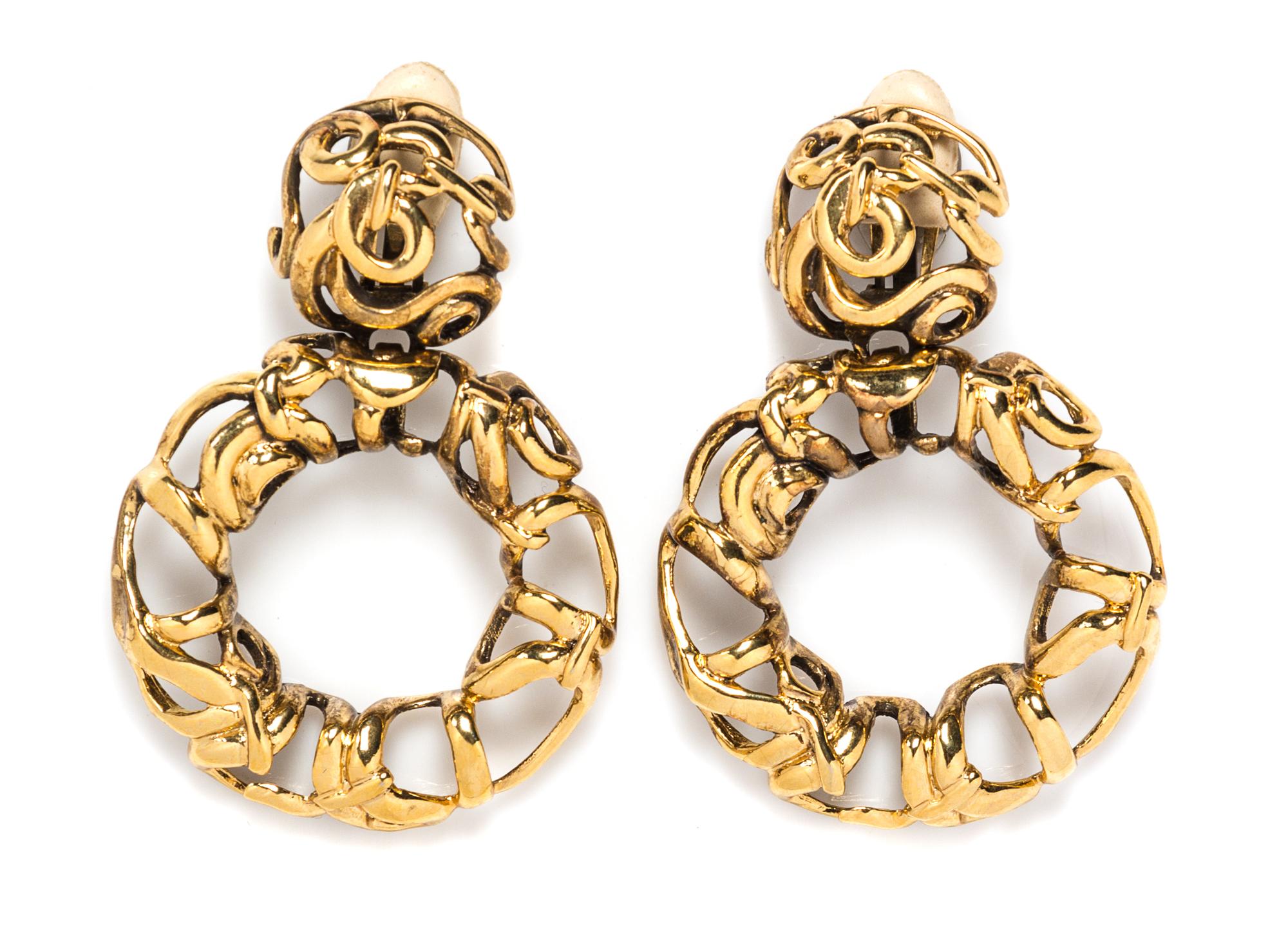 A Pair of Les Bernard Goldtone Large Drop Earclips, 3" x 2.5".