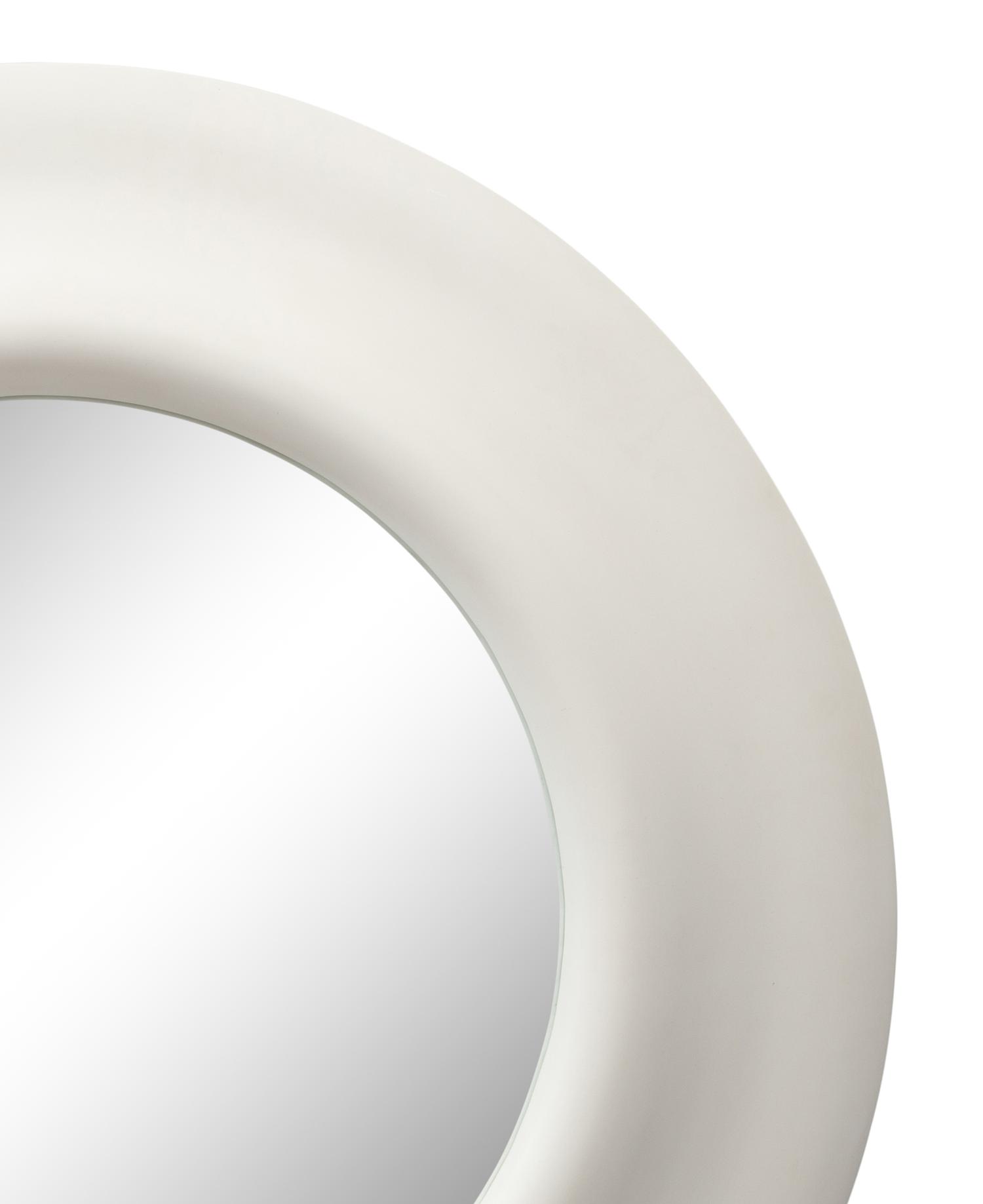 A Matte White Round Mirror