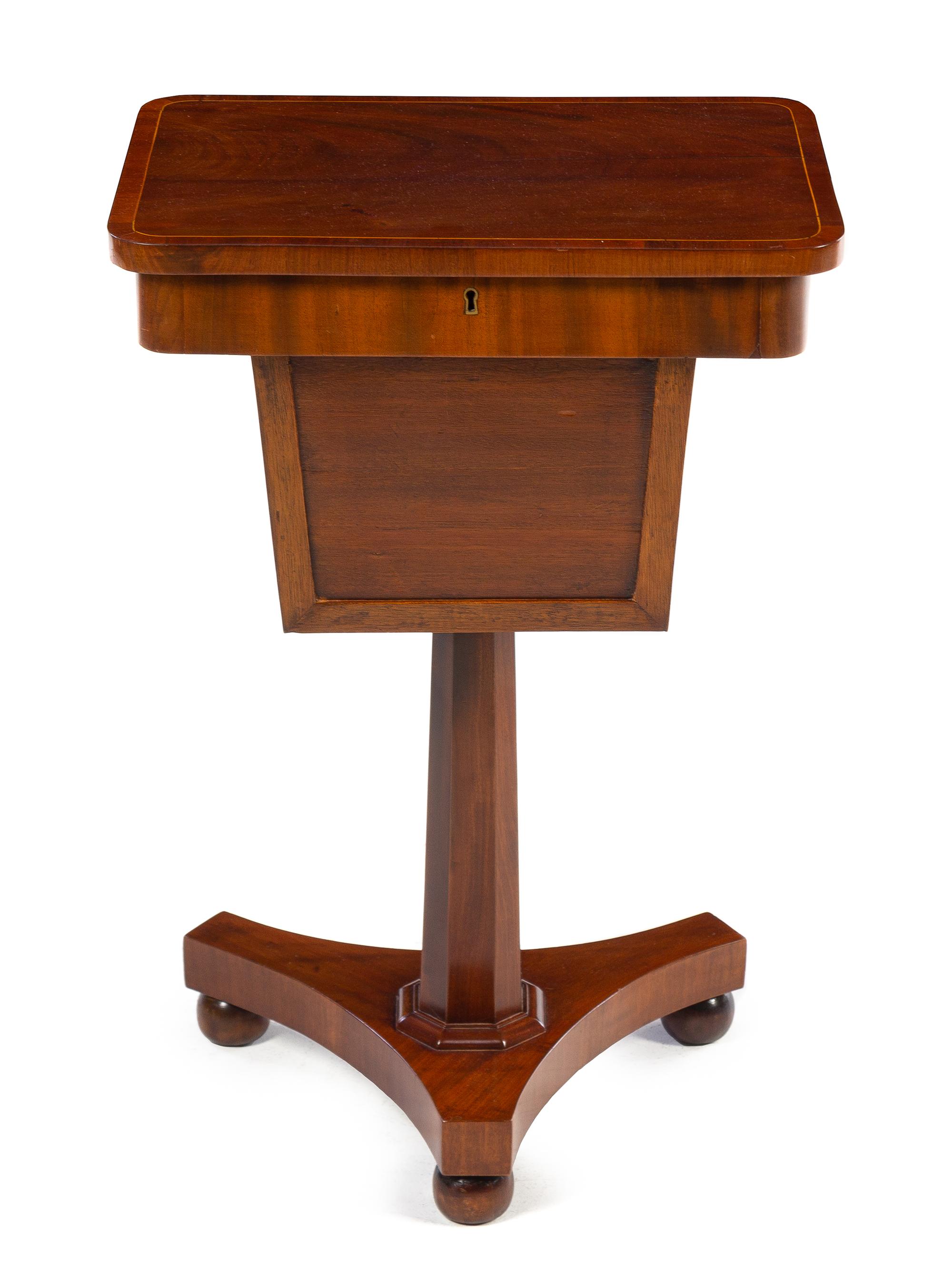 A Regency Style Mahogany Tea Poy Height 28 inches. — 19TH CENTURY