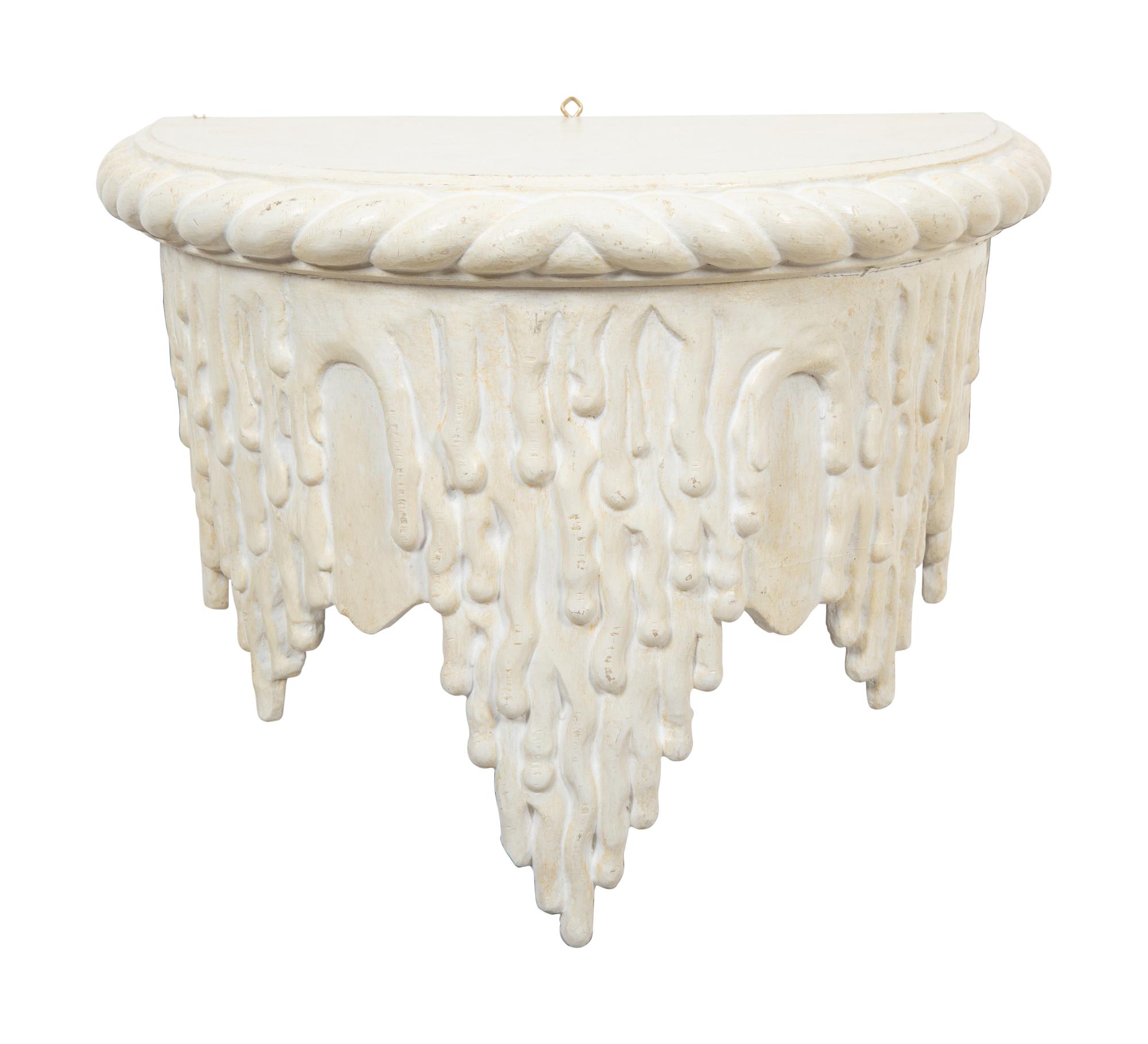 A Pair of White Painted Grotto Style Wall Brackets