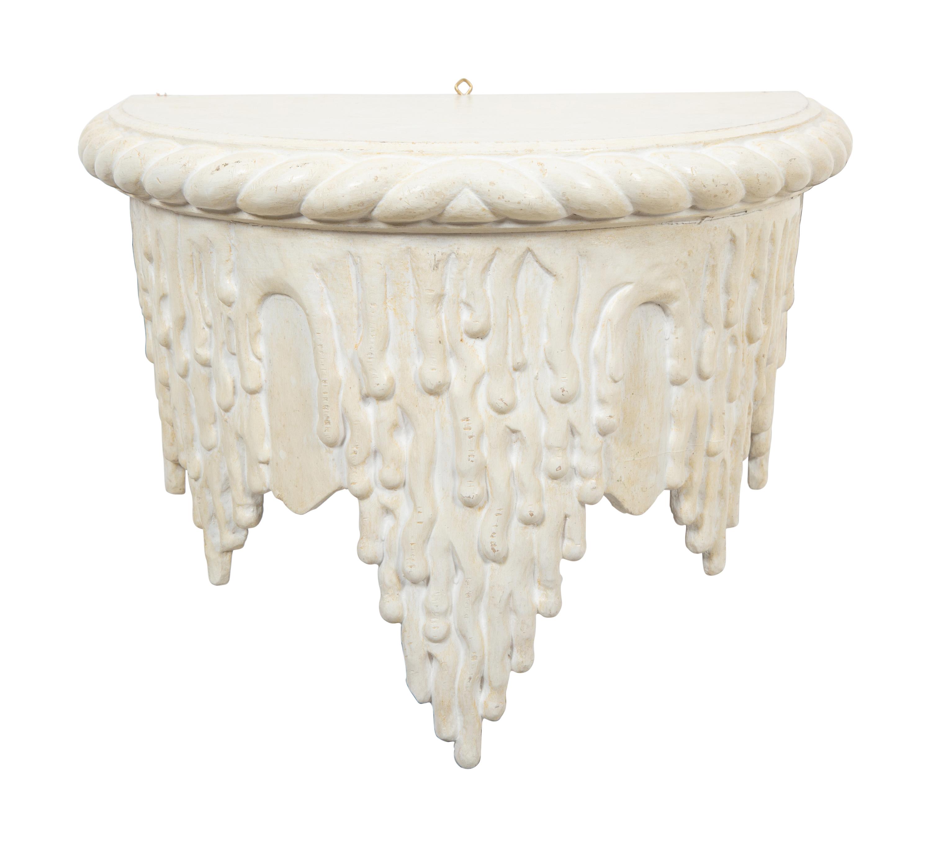 A Pair of White Painted Grotto Style Wall Brackets