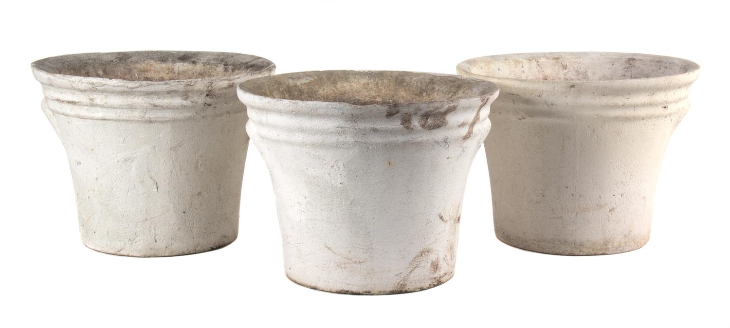 A Group of Five Concrete Planters Height of largest 13 1/2 inches x diameter 17 inches.