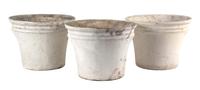 A Group of Five Concrete Planters Height of largest 13 1/2 inches x diameter 17 inches.