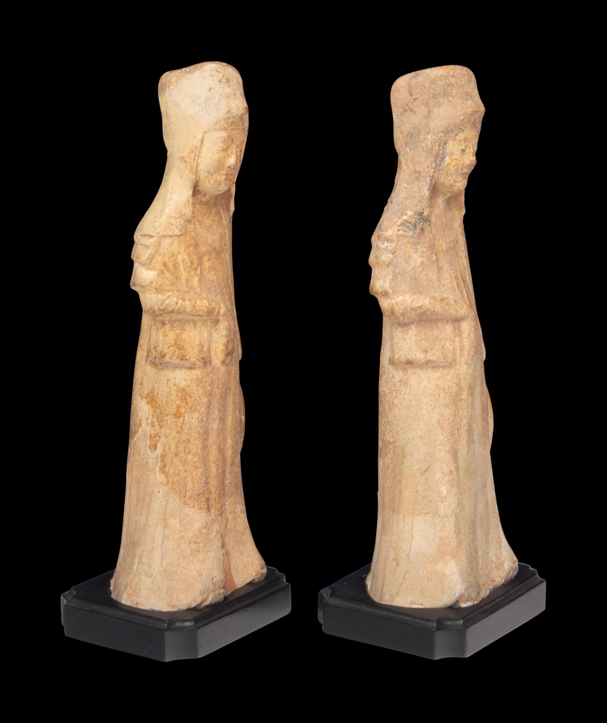 A Pair of Chinese Painted Pottery Figures of Ladies