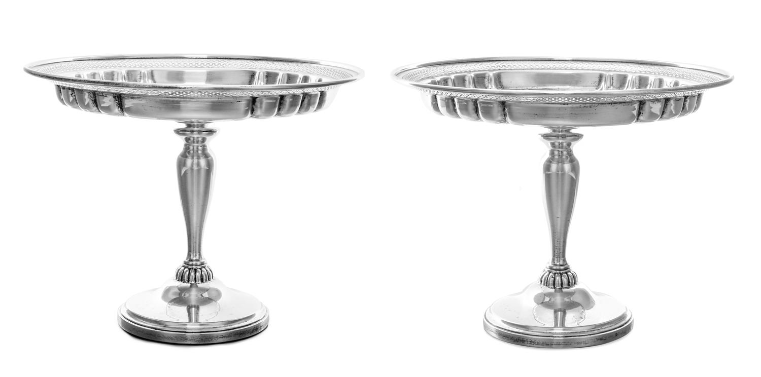 A Pair of American Silver Compotes, Redlich & Co., New York, NY, the partly lobed circular bowls with pierced borders, raised on balust