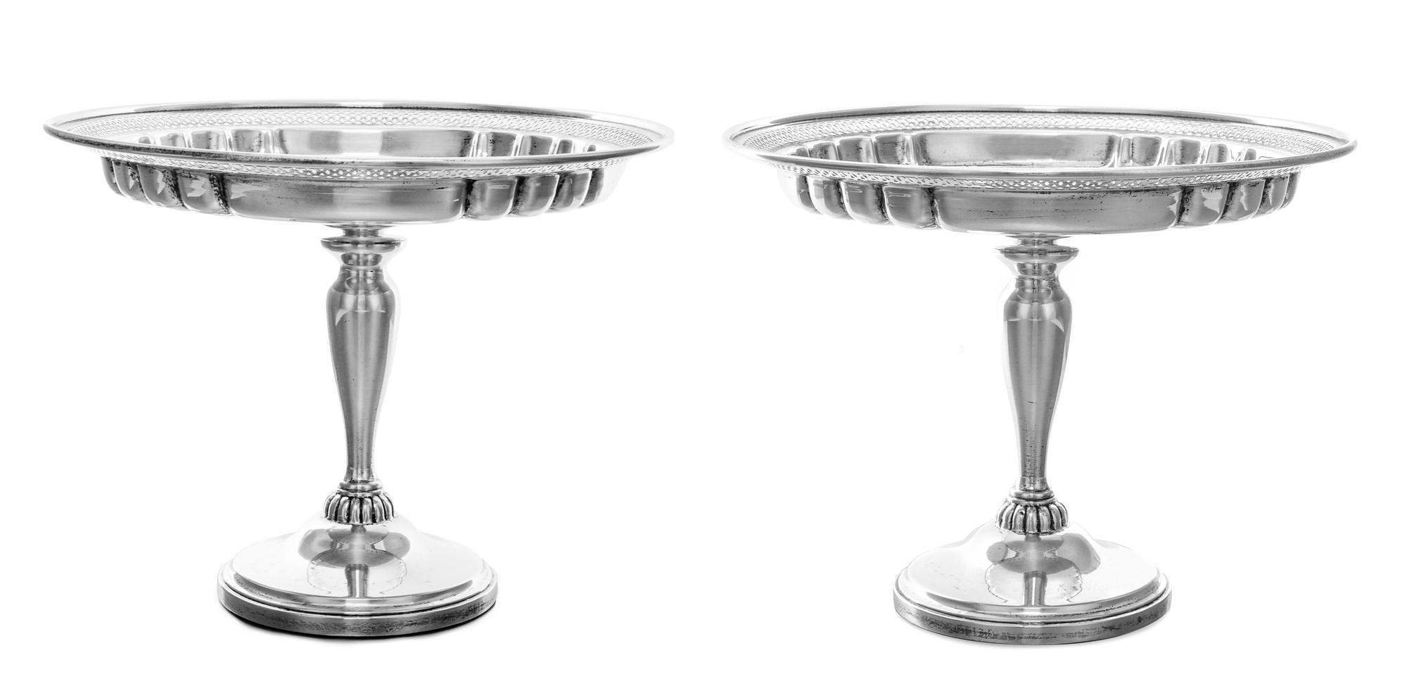 A Pair of American Silver Compotes, Redlich & Co., New York, NY, the partly lobed circular bowls with pierced borders, raised on balust