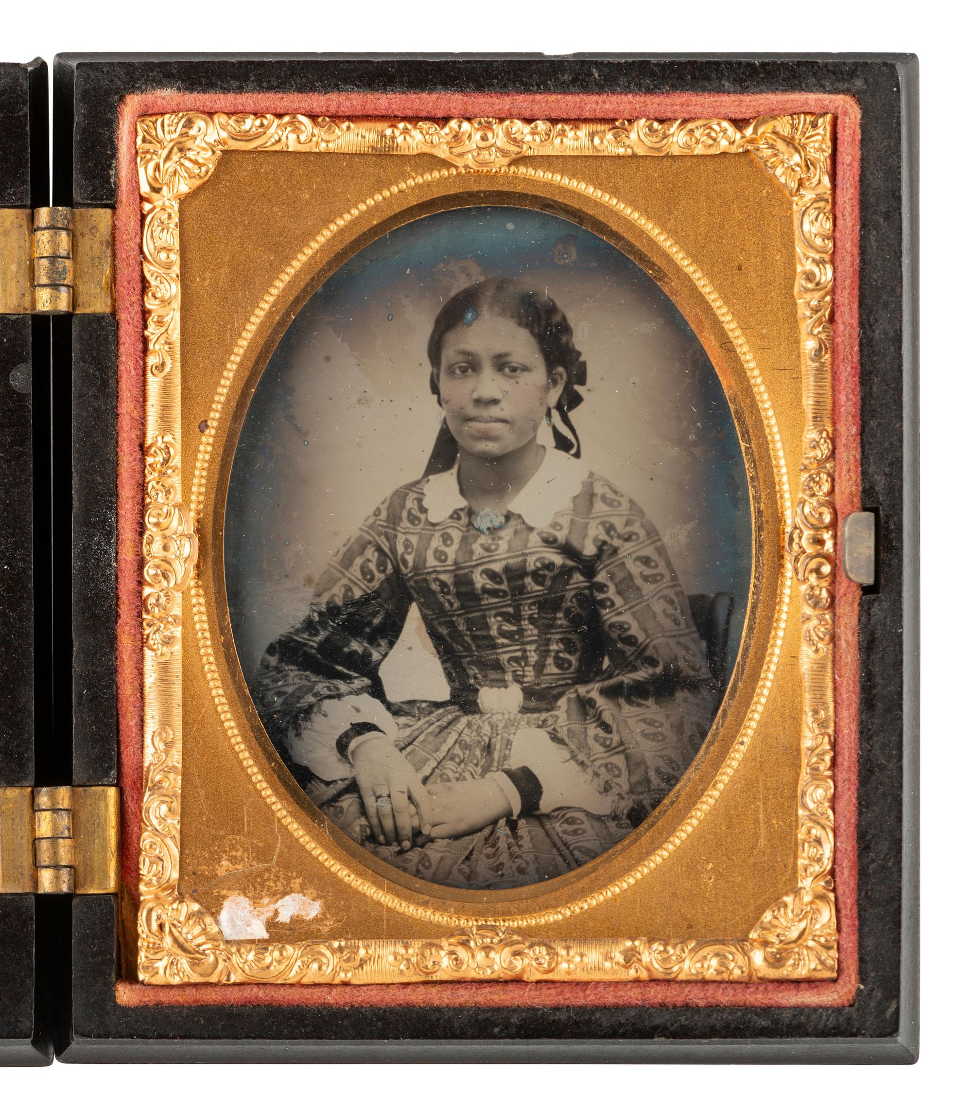[EARLY PHOTOGRAPY]. Ninth plate ambrotype featuring a beautiful African American young lady.