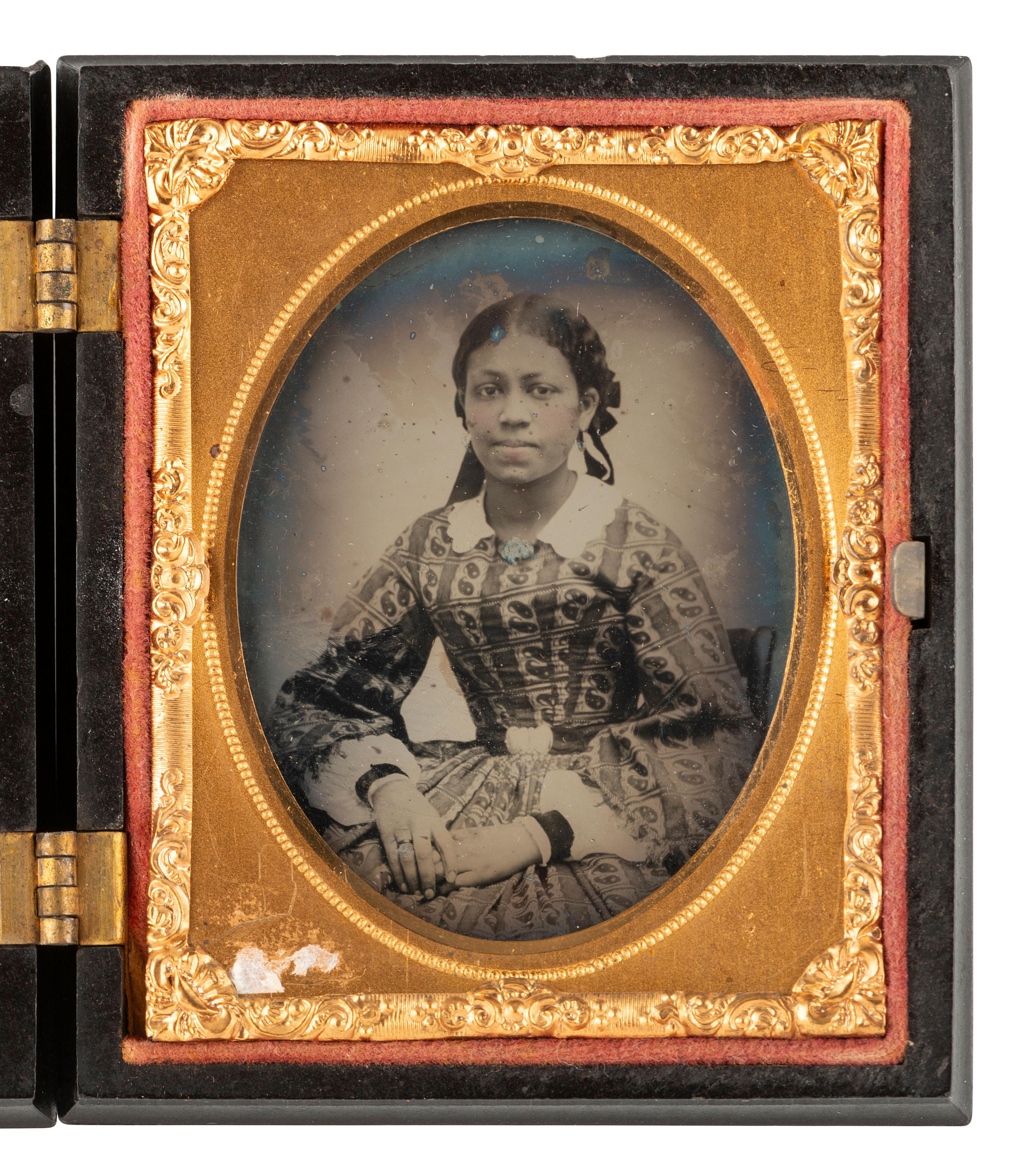 [EARLY PHOTOGRAPY]. Ninth plate ambrotype featuring a beautiful African American young lady.
