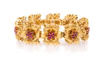 An 18 Karat Yellow Gold and Ruby Flower Bracelet, Tiffany & Co., 31.90 dwts.