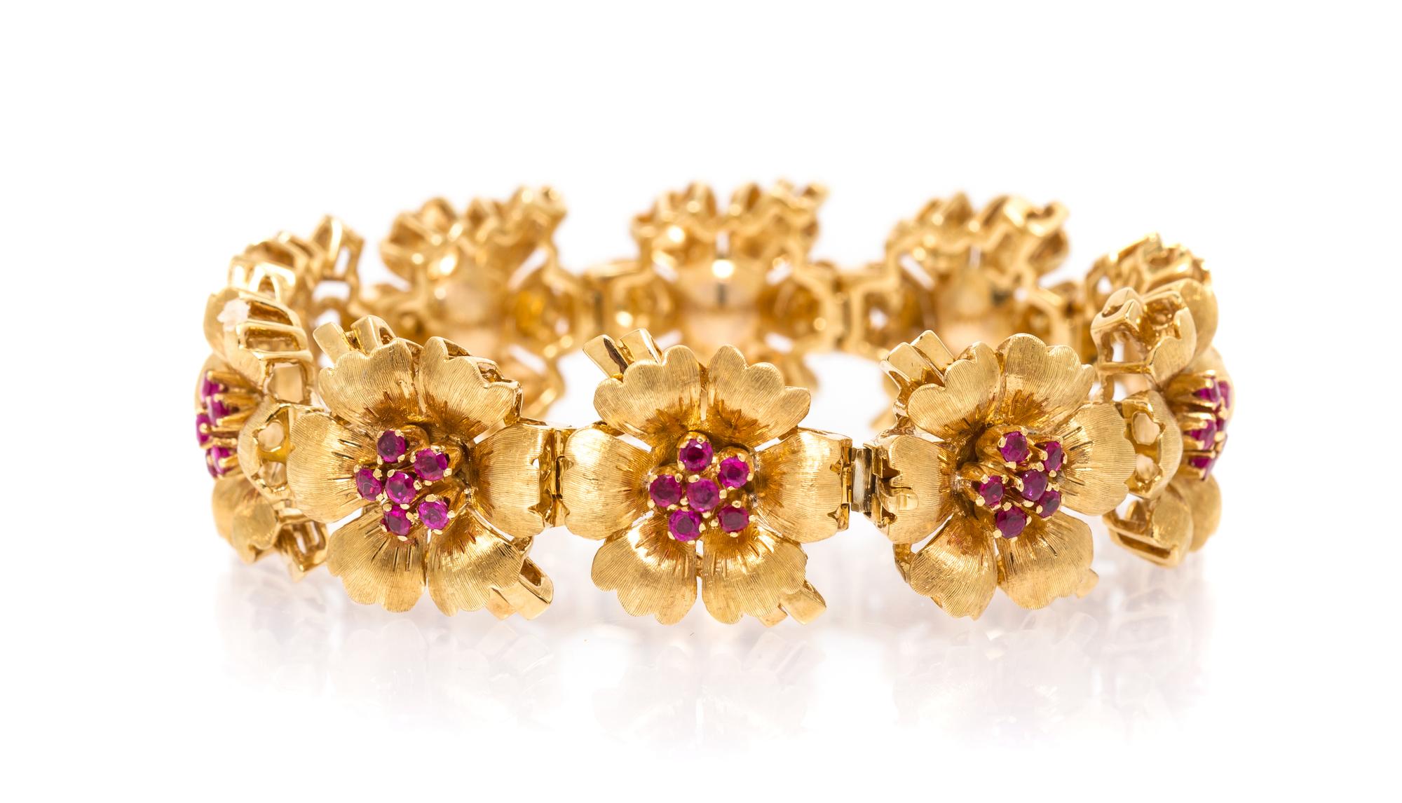 An 18 Karat Yellow Gold and Ruby Flower Bracelet, Tiffany & Co., 31.90 dwts.