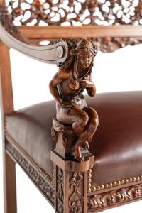 An Italian Renaissance Revival Carved Walnut Throne Chair