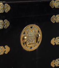 A Chinese or Korean Export Lacquer-Finished Brass Mounted Trunk