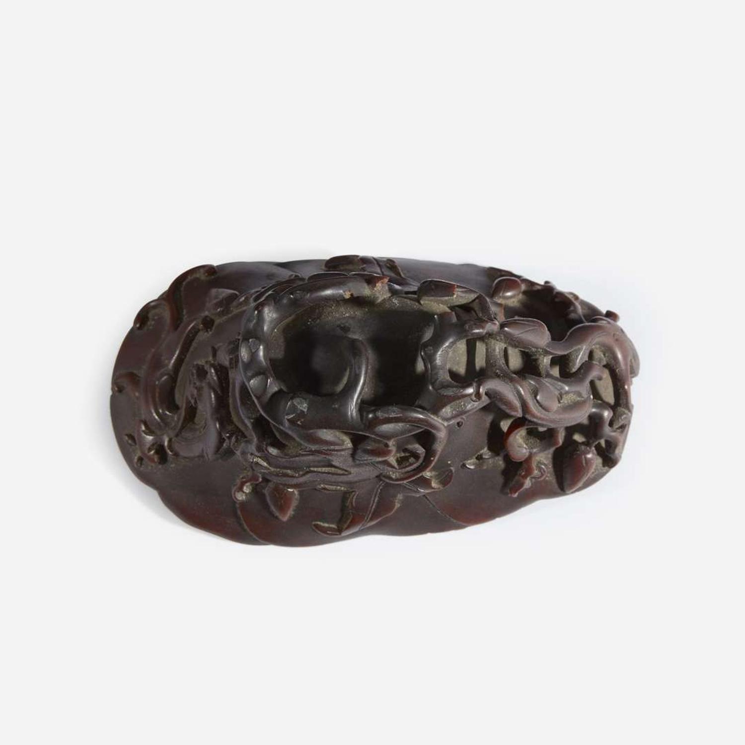 A Chinese Carved Rhinoceros Horn Libation Cup 17th/18th century